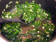 Add greens to water or broth.  Cover and simmer for 4 minutes.  Remove cover, continue cooking, stirring constantly until greens have wilted.  Add salt and pepper to taste. 