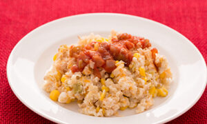 a plate of Chicken, Corn, and Rice Casserole