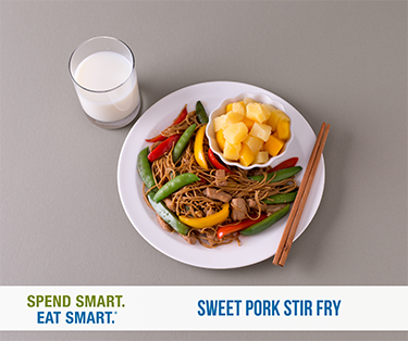sweet pork stir fry on a plate