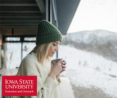 woman drinking coffee outside thinking